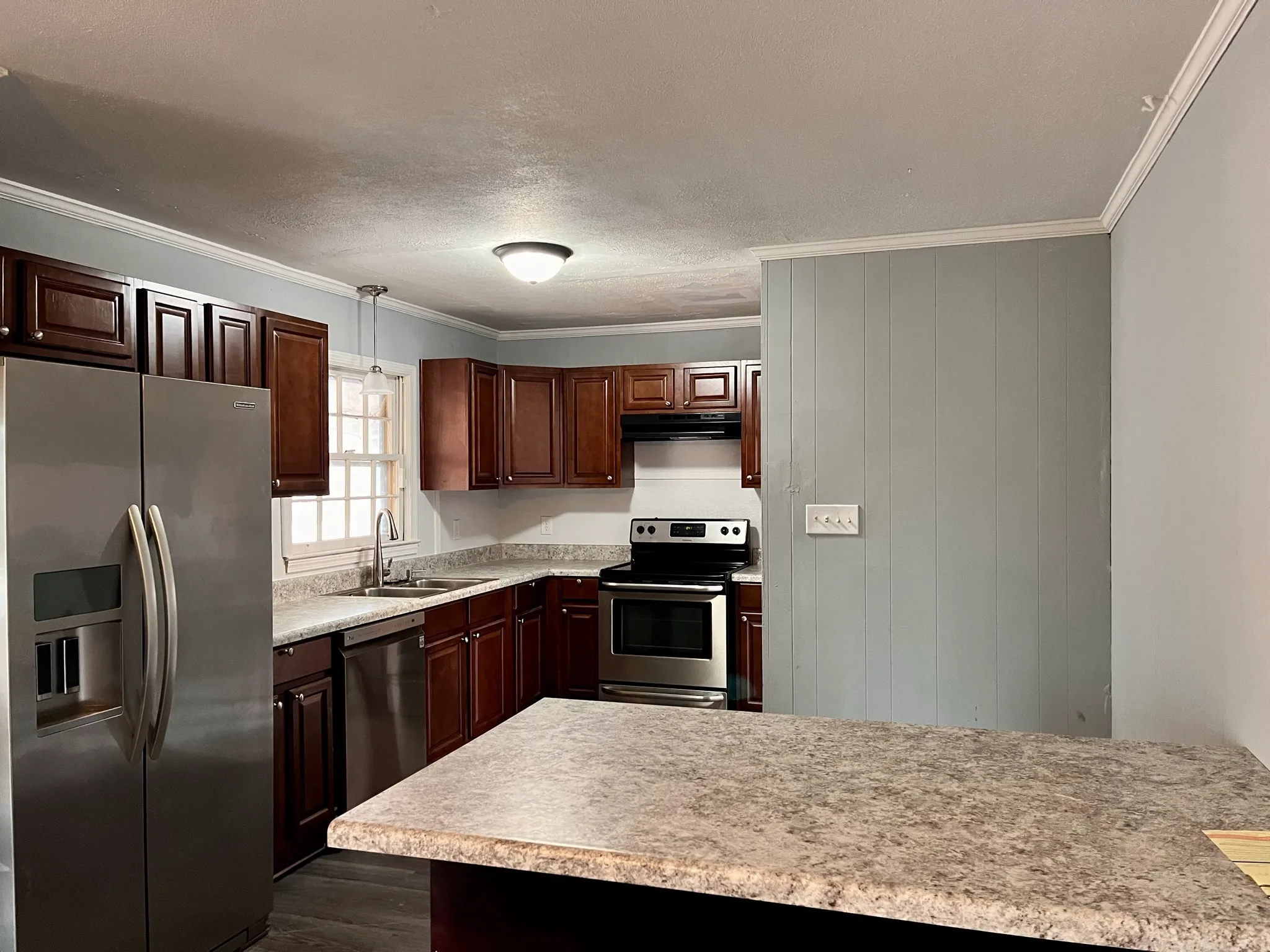 Picture of kitchen after we bought the house